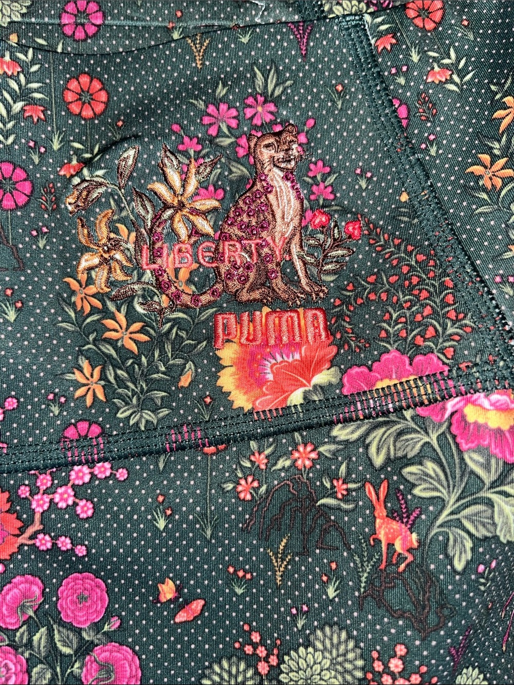 Puma Liberty Floral Leggings in Dark Green with Coral and Pink Accents medium